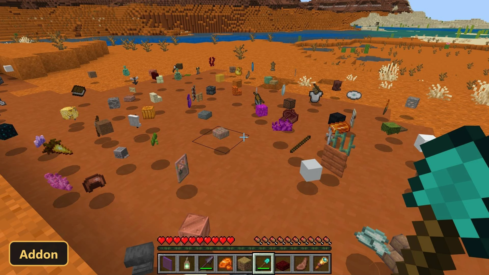 desert biome with many items and blocks scattered on the ground