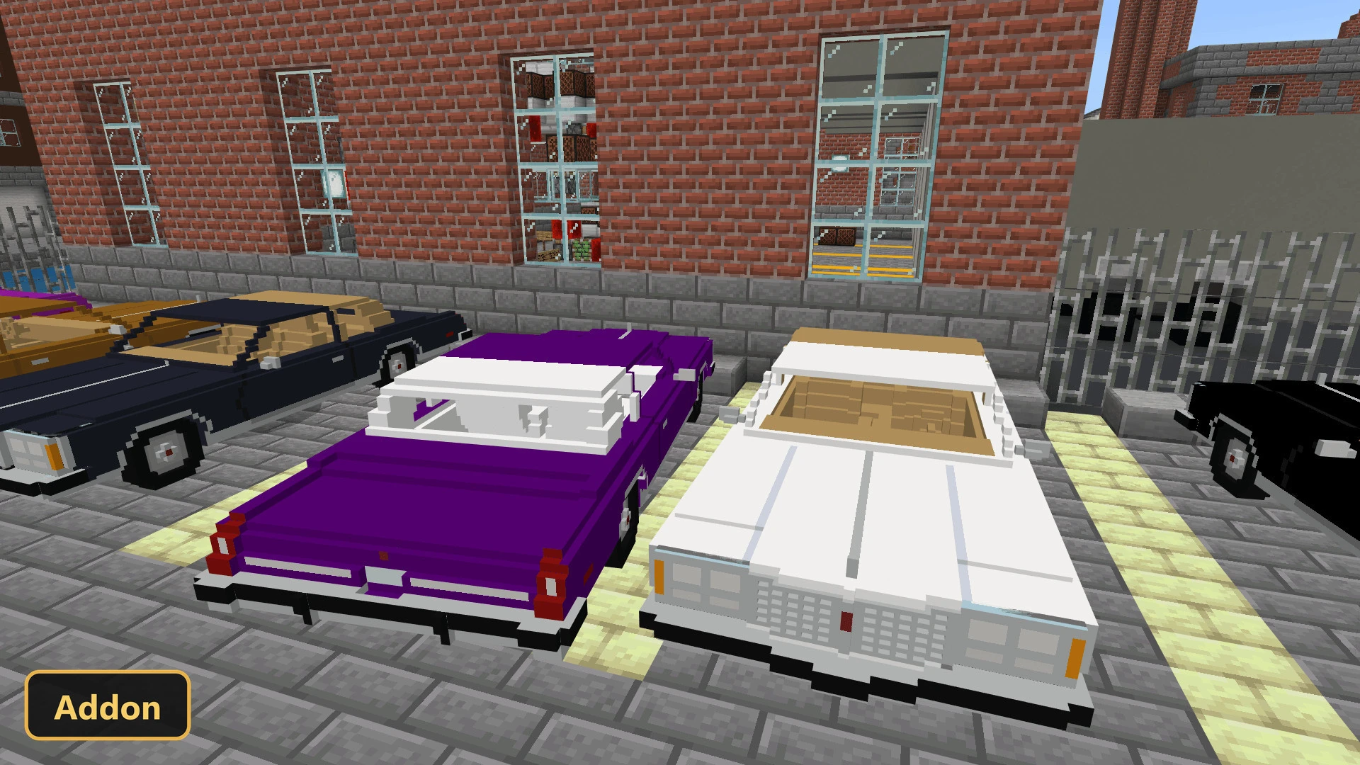 two cars, purple and white, parked on a city street