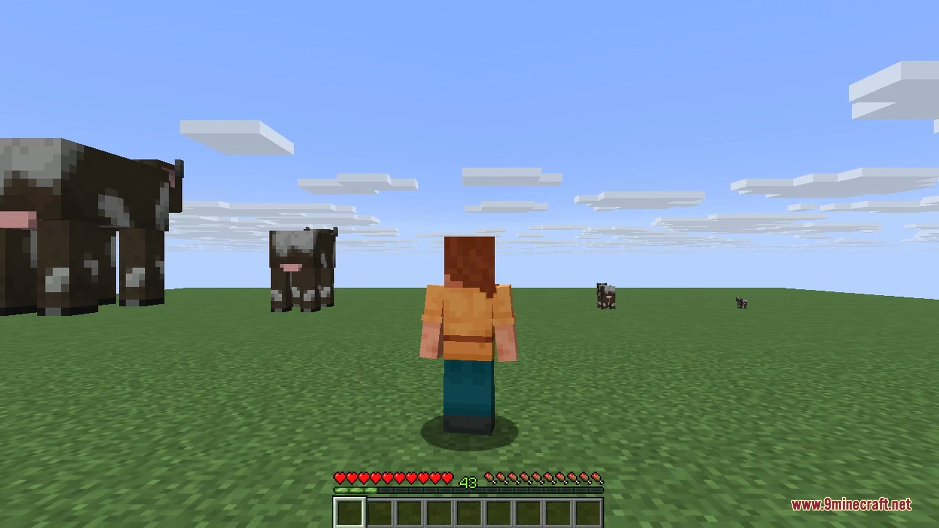 A massive creeper looms at several times its usual height